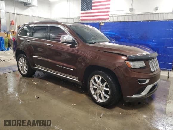 ✅ 2014 Jeep Grand Cherokee Summit • VIN: 1C4RJFJT6EC276110 • Lot: 90085555. Listed on Copart with 266,904 mi. Free auction sales archive from the USA and detailed vehicle history report at DreamBid. Image 4.