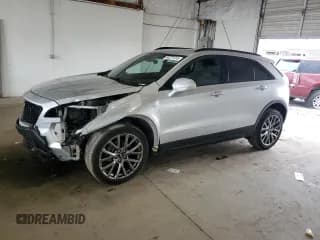 ✅ 2020 Cadillac XT4 FWD Sport • VIN: 1GYFZER47LF035309 • Лот: 64571415. Опубликован ранее на Copart с пробегом 61 052 миль. Бесплатный доступ к архиву аукционных продаж из США и подробный отчёт об истории автомобиля на DreamBid. Изображение 1.