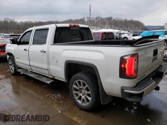 ✅ 2018 GMC Sierra 1500 Denali • VIN: 3GTU2PEC1JG112990 • Лот: 89246905. Опубликован ранее на Copart с пробегом 131 601 миль. Бесплатный доступ к архиву аукционных продаж из США и подробный отчёт об истории автомобиля на DreamBid. Изображение 2.