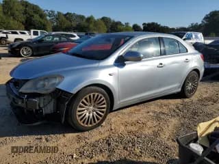 ✅ 2012 Suzuki Kizashi SE • VIN: JS2RE9A33C6100834 • Лот: 82506565. Опубликован ранее на Copart с пробегом 47 868 миль. Бесплатный доступ к архиву аукционных продаж из США и подробный отчёт об истории автомобиля на DreamBid. Изображение 1.