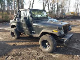 ✅ 1990 Jeep Wrangler S • VIN: 2J4FY19E1LJ505667 • Lot: 42788286. Listed on IAAI with 207,813 mi. Free auction sales archive from the USA and detailed vehicle history report at DreamBid. Image 1.