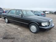 ✅ 1990 Mercedes-Benz 560 • VIN: WDBCA39E4LA534349 • Lot: 42201056. Listed on IAAI with 211,470 mi. Free auction sales archive from the USA and detailed vehicle history report at DreamBid. Image 1.