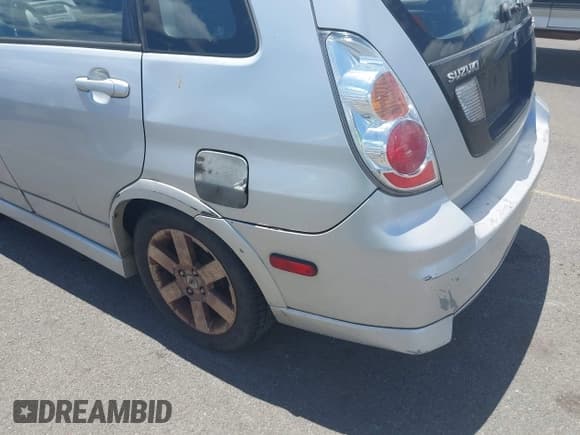 ✅ 2006 Suzuki Aerio SX • VIN: JS2RC61H365350326 • Lot: 42496107. Listed on IAAI with 102,360 mi. Free auction sales archive from the USA and detailed vehicle history report at DreamBid. Image 6.