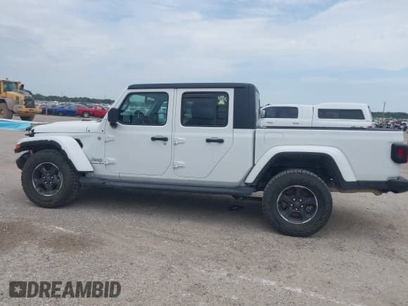 ✅ 2023 Jeep Gladiator High Altitude • VIN: 1C6HJTFG8PL553372 • Лот: 42900480. Опубликован ранее на IAAI с пробегом 14 725 миль. Бесплатный доступ к архиву аукционных продаж из США и подробный отчёт об истории автомобиля на DreamBid. Изображение 15.