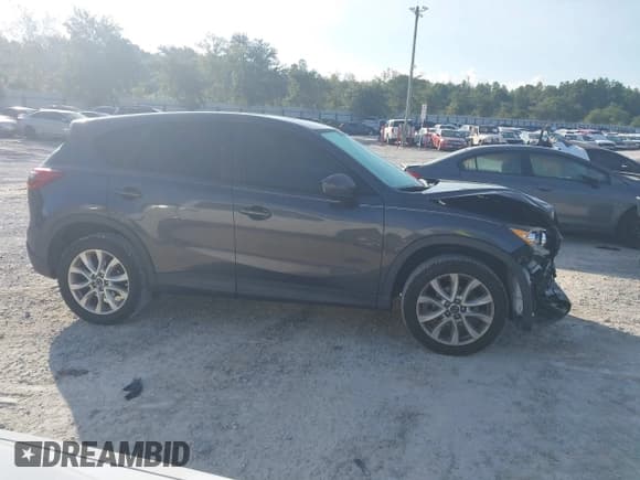 ✅ 2014 Mazda CX-5 Grand Touring • VIN: JM3KE2DY7E0300395 • Лот: 43293604. Опубликован ранее на IAAI с пробегом 161 782 миль. Бесплатный доступ к архиву аукционных продаж из США и подробный отчёт об истории автомобиля на DreamBid. Изображение 13.