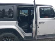 ✅ 2023 Jeep Wrangler Sahara • VIN: 1C4JJXP65PW696141 • Lot: 43364969. Listed on IAAI with 31,704 mi. Free auction sales archive from the USA and detailed vehicle history report at DreamBid. Image 8.