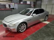 ✅ 2005 Maserati Quattroporte • VIN: ZAMCE39A750014721 • Lot: 54172645. Listed on Copart with 24,604 mi. Free auction sales archive from the USA and detailed vehicle history report at DreamBid. Image 1.