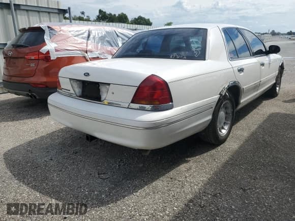 ✅ 2000 Ford Crown Victoria LX • VIN: 2FAFP74W0YX125516 • Лот: 71779885. Опубликован ранее на Copart с пробегом 79 292 миль. Бесплатный доступ к архиву аукционных продаж из США и подробный отчёт об истории автомобиля на DreamBid. Изображение 3.