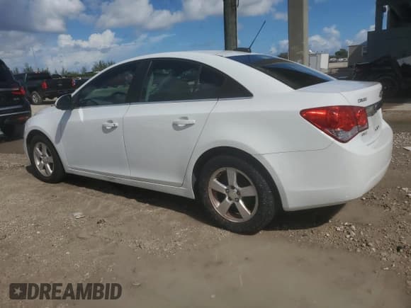 ✅ 2016 Chevrolet Cruze LT • VIN: 1G1PE5SB0G7211513 • Lot: 82763225. Listed on Copart with 73,452 mi. Free auction sales archive from the USA and detailed vehicle history report at DreamBid. Image 2.