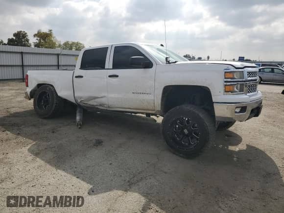 2014 Chevrolet Silverado 1500 LT с VIN 3GCUKRECXEG261755, выставлен на аукционе Copart как лот 87444585 с пробегом 119 580 миль миль и Списание • Salvage title. История ставок и продаж доступна на DreamBid. Изображение 4.