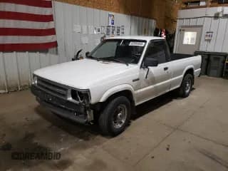 ✅ 1990 Mazda B-Series • VIN: JM2UF1131L0914191 • Lot: 62086955. Wystawiony na Copart z przebiegiem 171 318 mil. Bezpłatny archiwum sprzedaży aukcyjnych z USA i szczegółowy raport historii pojazdu na DreamBid. Zdjęcie 1.