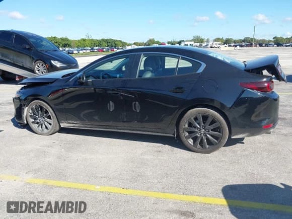 ✅ 2025 Mazda 3 S Select Sport • VIN: 3MZBPABM6SM456091 • Лот: 43505774. Опубликован ранее на IAAI с пробегом 17 067 миль. Бесплатный доступ к архиву аукционных продаж из США и подробный отчёт об истории автомобиля на DreamBid. Изображение 14.