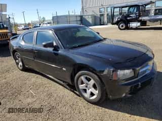 2010 Dodge Charger SXT с VIN 2B3CA3CV5AH252070, выставлен на аукционе Copart как лот 79210224 с пробегом 208 260 миль миль и Списание • Salvage title. История ставок и продаж доступна на DreamBid. Изображение 4.