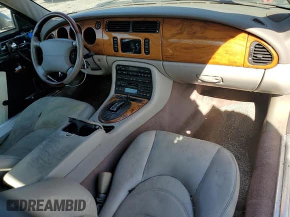 ✅ 2002 Jaguar XK • VIN: SAJDA42B22PA26487 • Лот: 84960735. Опубликован ранее на Copart с пробегом 132 063 миль. Бесплатный доступ к архиву аукционных продаж из США и подробный отчёт об истории автомобиля на DreamBid. Изображение 8.