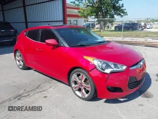 ✅ 2012 Hyundai Veloster w/Gray Int • VIN: KMHTC6AD0CU040970 • Lot: 42174672. Listed on IAAI with 142,310 mi. Free auction sales archive from the USA and detailed vehicle history report at DreamBid. Image 1.