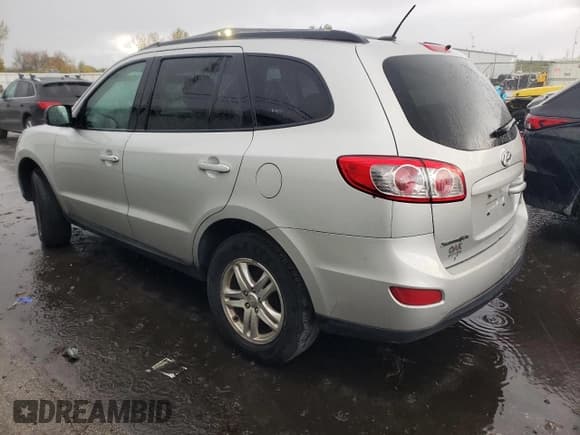 ✅ 2012 Hyundai Santa Fe GLS • VIN: 5XYZGDAB5CG160464 • Lot: 76205014. Listed on Copart with Not provided. Free auction sales archive from the USA and detailed vehicle history report at DreamBid. Image 2.