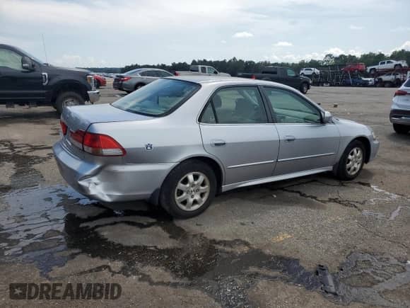 2001 Honda Accord EX с VIN JHMCG56671C001355, выставлен на аукционе Copart как лот 64389565 с пробегом 134 096 миль миль и Списание • Salvage title. История ставок и продаж доступна на DreamBid. Изображение 3.