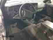 2000 Dodge Dakota Sport z VIN 1B7GG22NXYS573079, wystawiony jako Copart lot #66582204 z przebiegiem 128 435 mil mil oraz Czysty tytuł • Clean title. Historia ofert i sprzedaży dostępna na DreamBid. Obrazek 8.