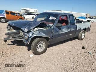 1990 Dodge Dakota with VIN 1B7FL23X7LS653679, listed as a Copart auction lot 72073034 with 254,327 mi miles and Salvage title. Bid and sale history available at DreamBid. Image 1.
