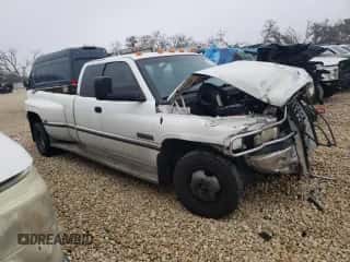 1997 Dodge 3500 z VIN 3B7MC33D5VM555393, wystawiony jako Copart lot #42702615 z przebiegiem 239 022 mil mil oraz Szkoda całkowita • Salvage title. Historia ofert i sprzedaży dostępna na DreamBid. Obrazek 4.