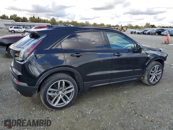 ✅ 2019 Cadillac XT4 FWD Sport • VIN: 1GYFZER47KF214268 • Лот: 86515845. Опубликован ранее на Copart с пробегом 82 212 миль. Бесплатный доступ к архиву аукционных продаж из США и подробный отчёт об истории автомобиля на DreamBid. Изображение 3.