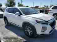 2019 Hyundai Santa Fe SE с VIN 5NMS23AD0KH001903, выставлен на аукционе Copart как лот 91165425 с пробегом 69 358 миль миль и Списание • Salvage title. История ставок и продаж доступна на DreamBid. Изображение 4.