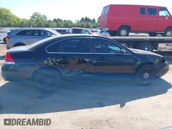 2013 Chevrolet Impala Police with VIN 2G1WD5E31D1256682, listed as a IAAI auction lot 42276990 with 148,251 mi miles and . Bid and sale history available at DreamBid. Image 14.