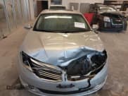 ✅ 2013 Lincoln MKZ • VIN: 3LN6L2J91DR805419 • Lot: 43565243. Listed on IAAI with 106,237 mi. Free auction sales archive from the USA and detailed vehicle history report at DreamBid. Image 13.