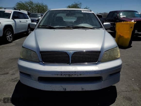 ✅ 2002 Mitsubishi Lancer OZ-Rally • VIN: JA3AJ86E12U057563 • Lot: 67379775. Listed on Copart with 187,217 mi. Free auction sales archive from the USA and detailed vehicle history report at DreamBid. Image 5.