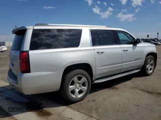 ✅ 2020 Chevrolet Suburban Premier • VIN: 1GNSCJKC0LR216855 • Lot: 72287114. Wystawiony na Copart z przebiegiem 94 642 mil. Bezpłatny archiwum sprzedaży aukcyjnych z USA i szczegółowy raport historii pojazdu na DreamBid. Zdjęcie 3.