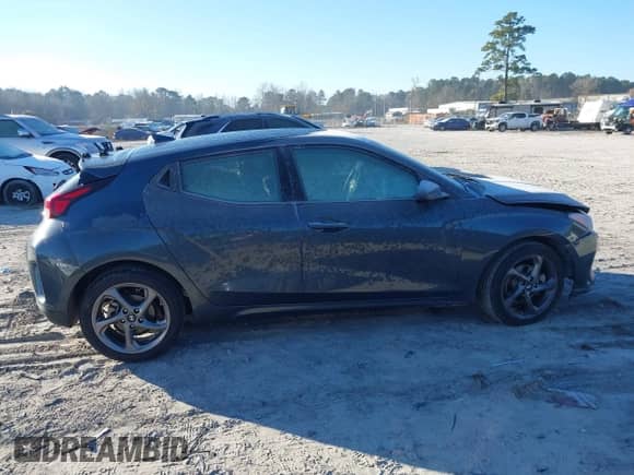 2021 Hyundai Veloster 2.0 z VIN KMHTG6AF3MU032658, wystawiony jako IAAI lot #41356076 z przebiegiem 70 881 mil mil oraz . Historia ofert i sprzedaży dostępna na DreamBid. Obrazek 13.