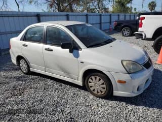 ✅ 2007 Suzuki Aerio S • VIN: JS2RA62S975353328 • Lot: 87390384. Wystawiony na Copart z przebiegiem 92 347 mil. Bezpłatny archiwum sprzedaży aukcyjnych z USA i szczegółowy raport historii pojazdu na DreamBid. Zdjęcie 4.