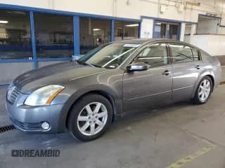 ✅ 2005 Nissan Maxima SL • VIN: 1N4BA41EX5C812828 • Лот: 93748535. Опубликован ранее на Copart с пробегом 74 403 миль. Бесплатный доступ к архиву аукционных продаж из США и подробный отчёт об истории автомобиля на DreamBid. Изображение 1.