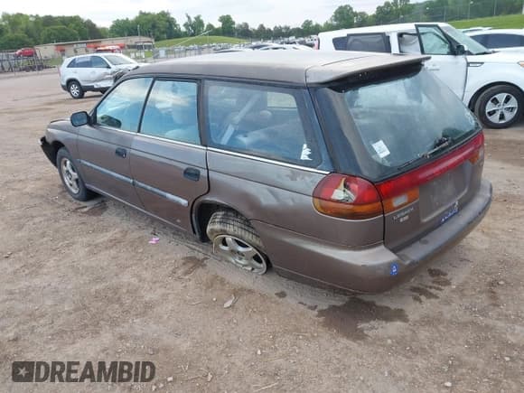 ✅ 1996 Subaru Legacy L • VIN: 4S3BK4356T7930613 • Lot: 42154833. Listed on IAAI with 142,569 mi. Free auction sales archive from the USA and detailed vehicle history report at DreamBid. Image 3.
