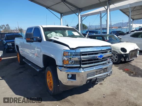 ✅ 2019 Chevrolet Silverado 2500HD LT • VIN: 1GC1KSEY5KF119090 • Лот: 41616445. Опубликован ранее на IAAI с пробегом 49 518 миль. Бесплатный доступ к архиву аукционных продаж из США и подробный отчёт об истории автомобиля на DreamBid. Изображение 1.