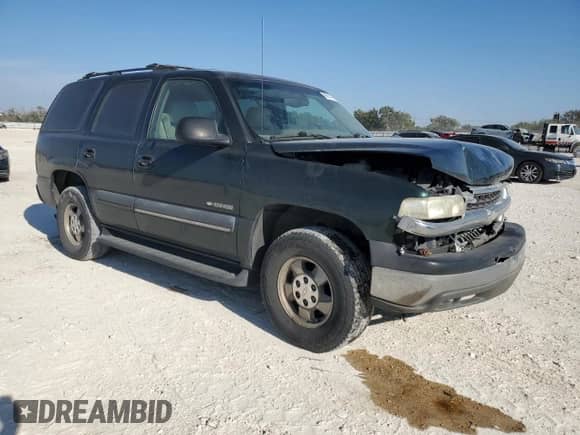 2002 Chevrolet Tahoe LS с VIN 1GNEC13Z92R195793, выставлен на аукционе Copart как лот 86814955 с пробегом 219 576 миль миль и Списание • Salvage title. История ставок и продаж доступна на DreamBid. Изображение 4.