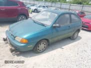 ✅ 1996 Ford Aspire • VIN: KNJLT05H4T6168919 • Lot: 42409726. Listed on IAAI with 149,205 mi. Free auction sales archive from the USA and detailed vehicle history report at DreamBid. Image 2.