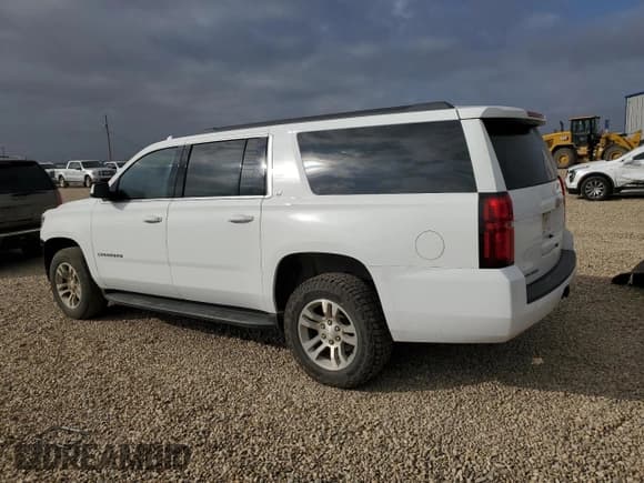 ✅ 2020 Chevrolet Suburban LT • VIN: 1GNSCHKC5LR119885 • Lot: 82712425. Listed on Copart with 220,324 mi. Free auction sales archive from the USA and detailed vehicle history report at DreamBid. Image 2.