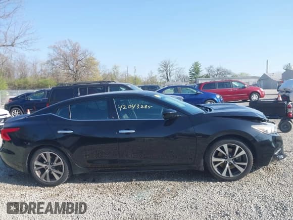 ✅ 2017 Nissan Maxima S • VIN: 1N4AA6AP3HC436857 • Lot: 42043285. Listed on IAAI with 258,410 mi. Free auction sales archive from the USA and detailed vehicle history report at DreamBid. Image 13.