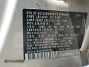 ✅ 2012 Volkswagen Tiguan LE • VIN: WVGAV7AX4CW556996 • Lot: 59082515. Listed on Copart with 131,394 mi. Free auction sales archive from the USA and detailed vehicle history report at DreamBid. Image 13.