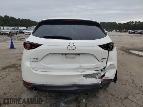 ✅ 2018 Mazda CX-5 Touring • VIN: JM3KFACM0J1429685 • Lot: 90691125. Listed on Copart with 82,393 mi. Free auction sales archive from the USA and detailed vehicle history report at DreamBid. Image 6.