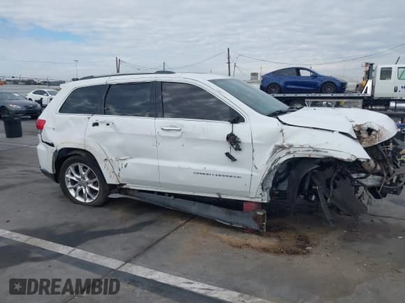 ✅ 2014 Jeep Grand Cherokee Summit • VIN: 1C4RJEJT0EC252136 • Lot: 40934162. Wystawiony na IAAI z przebiegiem 137 578 mil. Bezpłatny archiwum sprzedaży aukcyjnych z USA i szczegółowy raport historii pojazdu na DreamBid. Zdjęcie 13.
