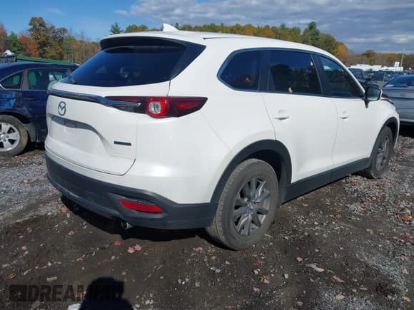 ✅ 2022 Mazda CX-9 Sport • VIN: JM3TCBBY0N0601507 • Lot: 43484543. Wystawiony na IAAI z przebiegiem 26 106 mil. Bezpłatny archiwum sprzedaży aukcyjnych z USA i szczegółowy raport historii pojazdu na DreamBid. Zdjęcie 4.