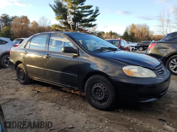 ✅ 2003 Toyota Corolla CE • VIN: JTDBR32E430023990 • Lot: 93284085. Listed on Copart with 195,005 mi. Free auction sales archive from the USA and detailed vehicle history report at DreamBid. Image 4.