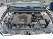 ✅ 2018 Mazda 3 Touring • VIN: 3MZBN1V32JM190611 • Lot: 42032844. Wystawiony na IAAI z przebiegiem 63 493 mil. Bezpłatny archiwum sprzedaży aukcyjnych z USA i szczegółowy raport historii pojazdu na DreamBid. Zdjęcie 10.