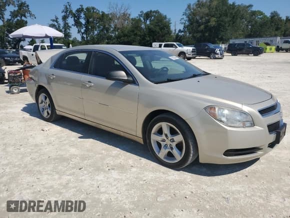 ✅ 2011 Chevrolet Malibu 1LS • VIN: 1G1ZB5E16BF252103 • Lot: 75622884. Listed on Copart with 71,899 mi. Free auction sales archive from the USA and detailed vehicle history report at DreamBid. Image 4.
