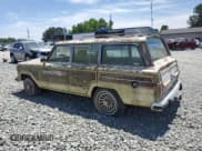 ✅ 1988 Jeep Grand Wagoneer • VIN: 1JCNJ15U3JT159548 • Lot: 57689105. Wystawiony na Copart z przebiegiem 146 992 mil. Bezpłatny archiwum sprzedaży aukcyjnych z USA i szczegółowy raport historii pojazdu na DreamBid. Zdjęcie 2.