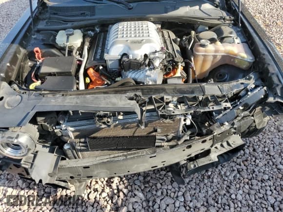 ✅ 2016 Dodge Challenger SRT Hellcat • VIN: 2C3CDZC90GH335396 • Lot: 71130534. Wystawiony na Copart z przebiegiem 49 941 mil. Bezpłatny archiwum sprzedaży aukcyjnych z USA i szczegółowy raport historii pojazdu na DreamBid. Zdjęcie 12.