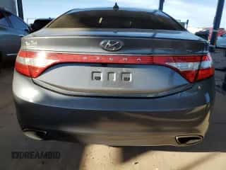 2013 Hyundai Azera z VIN KMHFH4JG9DA252363, wystawiony jako Copart lot #46349175 z przebiegiem 121 207 mil mil oraz Szkoda całkowita • Salvage title. Historia ofert i sprzedaży dostępna na DreamBid. Obrazek 6.