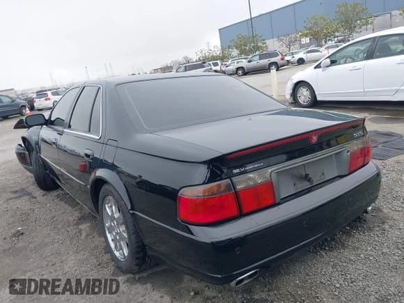✅ 2002 Cadillac Seville Touring STS • VIN: 1G6KY54982U239673 • Lot: 41657709. Wystawiony na IAAI z przebiegiem 92 224 mil. Bezpłatny archiwum sprzedaży aukcyjnych z USA i szczegółowy raport historii pojazdu na DreamBid. Zdjęcie 3.